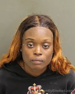 Mugshot of ALLYCIA ADRIAN ADAMS booked in Orange County, Florida on April 16, 2026