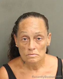 Mugshot of CARMEN LYDIA MASSA booked in Orange County, Florida on April 17, 2026