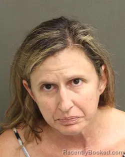 Mugshot of DEBORAH ELAINE MIZELL booked in Orange County, Florida on April 18, 2026