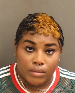 Mugshot of MYISHA RONNETTA PARRAMORE booked in Orange County, Florida on April 18, 2026