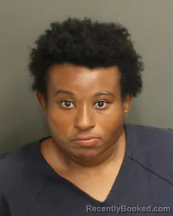 Mugshot of TAYLOR LEANN COOPER booked in Orange County, Florida on April 19, 2026