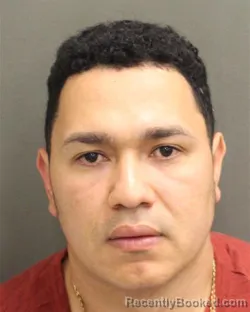 Mugshot of CARLOS CRUZ booked in Orange County, Florida on April 19, 2026
