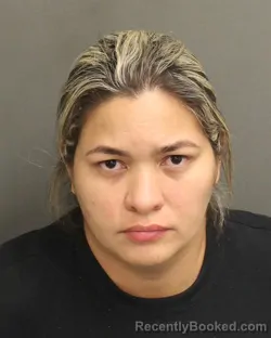 Mugshot of MARIELY CAROLINA DARIASCAPANO booked in Orange County, Florida on April 20, 2026
