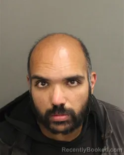 Mugshot of JAWAD HUSSAIN JANJUA booked in Orange County, Florida on April 20, 2026