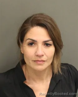 Mugshot of FERNANDA ROMANA LINHARES booked in Orange County, Florida on April 20, 2026