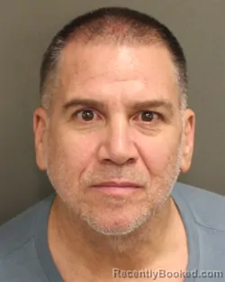 Mugshot of JOEL ALSINATAMAYO booked in Orange County, Florida on April 20, 2026