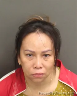 Mugshot of HANG THI NGOC TRINH booked in Orange County, Florida on April 20, 2026