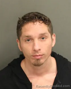 Mugshot of JASON ALBERTO JR TORRES booked in Orange County, Florida on April 21, 2026