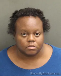Mugshot of YVONNE EDITH OTWOMA booked in Orange County, Florida on April 21, 2026