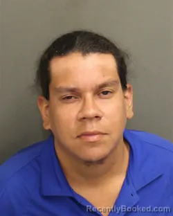 Mugshot of EDUARDO JOSE PRADO booked in Orange County, Florida on April 21, 2026