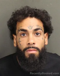 Mugshot of ALBERTO JOSHUA TORRES booked in Orange County, Florida on April 21, 2026