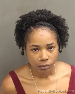 Mugshot of RONNAIAH NACHELLE BROWN booked in Orange County, Florida on April 21, 2026
