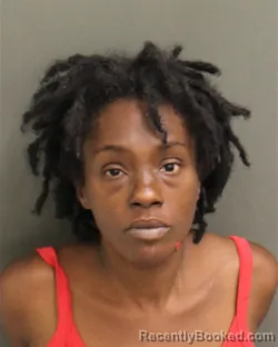 Mugshot of LATIANA MARIE GIBSONTESSIER booked in Orange County, Florida on April 21, 2026