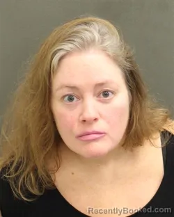 Mugshot of JENNIFER LOGAN MAY booked in Orange County, Florida on April 22, 2026
