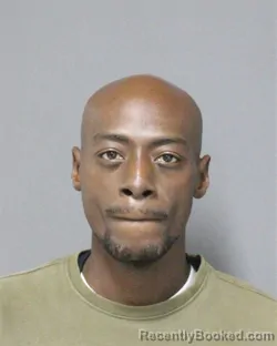 Mugshot of JUSTIN DEMETRIOUS DAVIS booked in Orange County, Florida on April 22, 2026