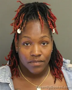 Mugshot of NAQUESHA MICHELLE JACKSON booked in Orange County, Florida on April 22, 2026