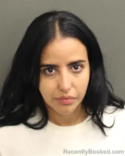 Mugshot of CAROLINA AGUDELOHERRERA booked in Orange County, Florida on April 23, 2026