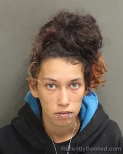 Mugshot of EBONY ELIZABETH BELL booked in Orange County, Florida on April 23, 2026