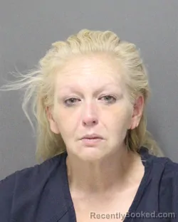 Mugshot of ANDREA CATHERINE BARBOZA booked in Orange County, Florida on April 23, 2026