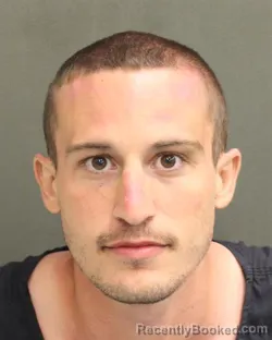 Mugshot of SAMUEL HENRY CHARRI booked in Orange County, Florida on April 23, 2026