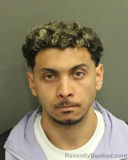 Mugshot of KHALED ELSAMRA booked in Orange County, Florida on April 24, 2026