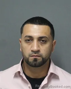 Mugshot of JORGE LUIS COLON booked in Orange County, Florida on April 24, 2026