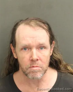 Mugshot of IAN PRESTON DRESSEL booked in Orange County, Florida on April 25, 2026