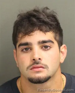 Mugshot of GILBERT JULIAN MARTINEZ booked in Orange County, Florida on April 25, 2026