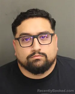 Mugshot of OSWALDO ENRIQUE JIMENEZDELGADO booked in Orange County, Florida on April 26, 2026