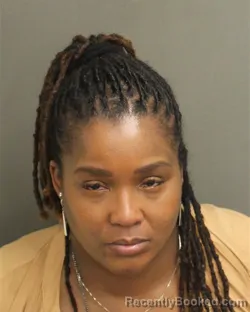 Mugshot of LENITA LANNETTA WARFIELD booked in Orange County, Florida on April 26, 2026