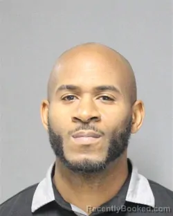 Mugshot of TRAVIS SHANTAY SLOAN booked in Orange County, Florida on April 27, 2026