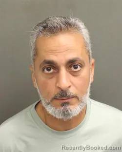 Mugshot of MOHAMED YOUSSEF ELATAWY booked in Orange County, Florida on April 27, 2026