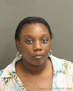 Mugshot of TSHERIA CHARMYNE DIXON booked in Orange County, Florida on April 29, 2026