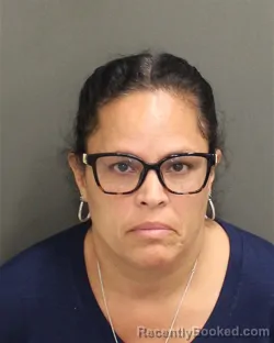 Mugshot of ELIZABETH TORRES booked in Orange County, Florida on April 29, 2026