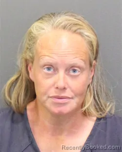 Mugshot of MALISA CATHERINE DOWNS booked in Orange County, Florida on April 30, 2026