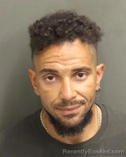 Mugshot of JOSET ANTHONY SANTIAGONAVEDO booked in Orange County, Florida on April 30, 2026