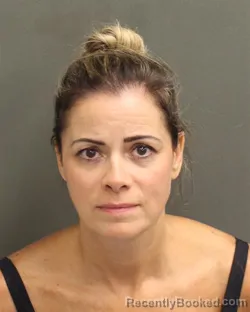 Mugshot of DANIELA BARROSHELMLINGERFE booked in Orange County, Florida on April 30, 2026