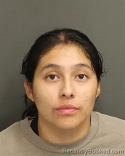 Mugshot of YAZMIN PERALTAFLORES booked in Orange County, Florida on May 1, 2026