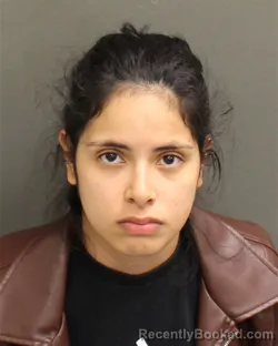 Mugshot of PAULA ANDREA GUZMANCUPAJA booked in Orange County, Florida on May 1, 2026