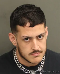 Mugshot of DAVEN CHRISTIAN CAMARGO booked in Orange County, Florida on May 1, 2026