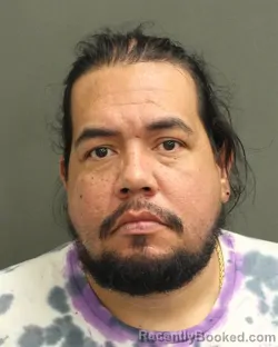 Mugshot of ALONSO JOSE PINAMEZA booked in Orange County, Florida on May 1, 2026