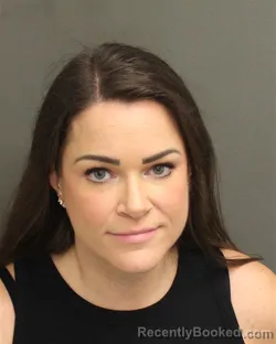 Mugshot of TAYLOR MARIE DEVAN booked in Orange County, Florida on May 3, 2026