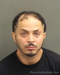 Mugshot of CHRISTOPHER LEE CALZADA booked in Orange County, Florida on May 3, 2026