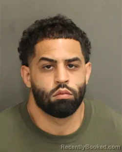 Mugshot of NESTOR RAFAEL ROSADO booked in Orange County, Florida on May 4, 2026