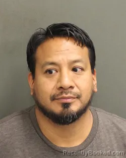 Mugshot of ALEJANDRO GARCIA booked in Orange County, Florida on May 4, 2026