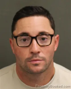Mugshot of MATTHEW RUBEN RODRIGUEZ booked in Orange County, Florida on May 4, 2026