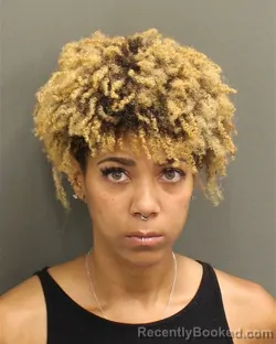 Mugshot of LASHANA JENAYE RAYMORE booked in Orange County, Florida on May 4, 2026