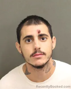 Mugshot of CALEB LEVI CABRAL booked in Orange County, Florida on May 5, 2026