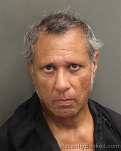 Mugshot of ALBERT MIKE ROBLEDO booked in Orange County, Florida on May 6, 2026