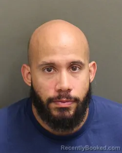 Mugshot of MIGUEL ALEJANDRO PAULA booked in Orange County, Florida on May 6, 2026